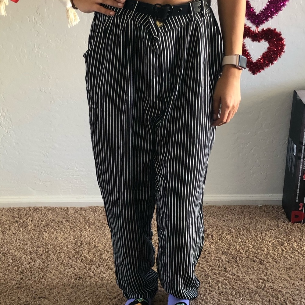 Black pants with white stripes